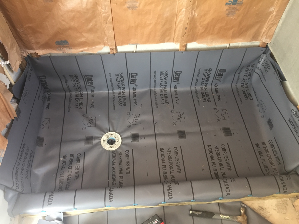 40 mil PVC shower pan liner installed before tile