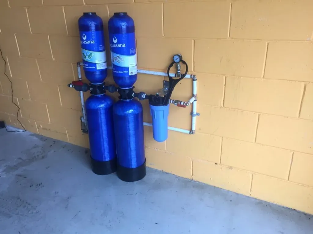 Whole-home water filtration system